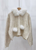 A Vintage Style Sweater with Delicate Timeless Details