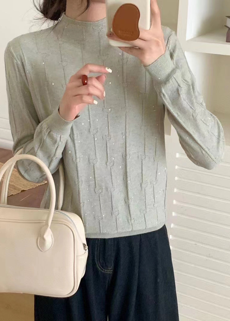 A Vintage Style Sweater with Delicate Timeless Details