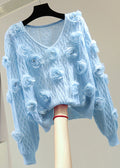 A Vintage Style Sweater with Delicate Timeless Details