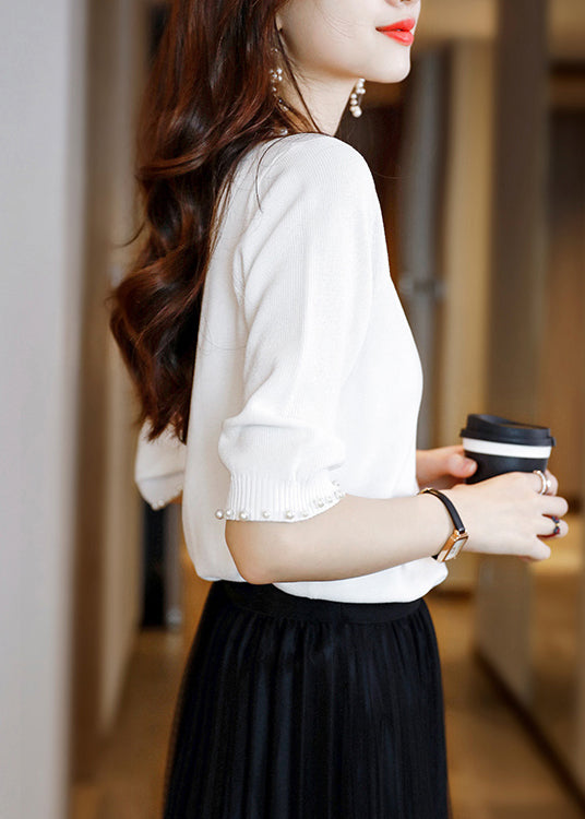 A Vintage Style Sweater with Delicate Timeless Details