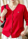 A Vintage Style Sweater with Delicate Timeless Details